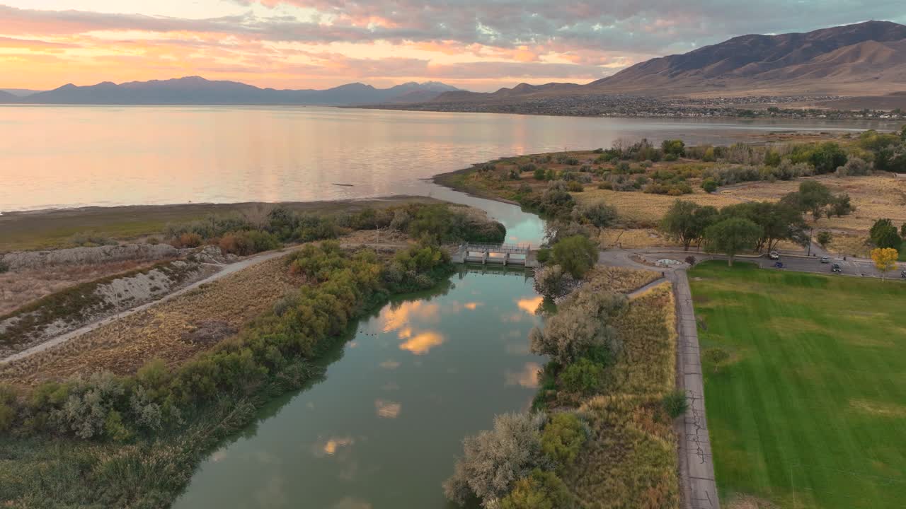 Reflections Of Clouds On The Jordan River At Utah Lake During Sunrise At Saratoga Springs, Aerial Flyover