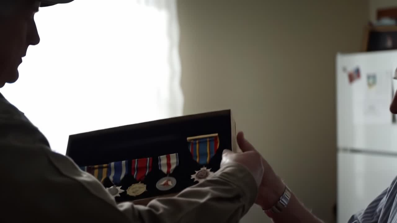 Honoring Valor: A Heartfelt Exchange Between Two Generations as Medals of Honor are Relived and Cherished in This Intimate Moment of Remembrance