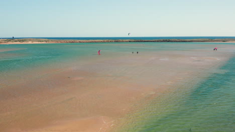 aerial: kitesurfing in the lagoon of alvor