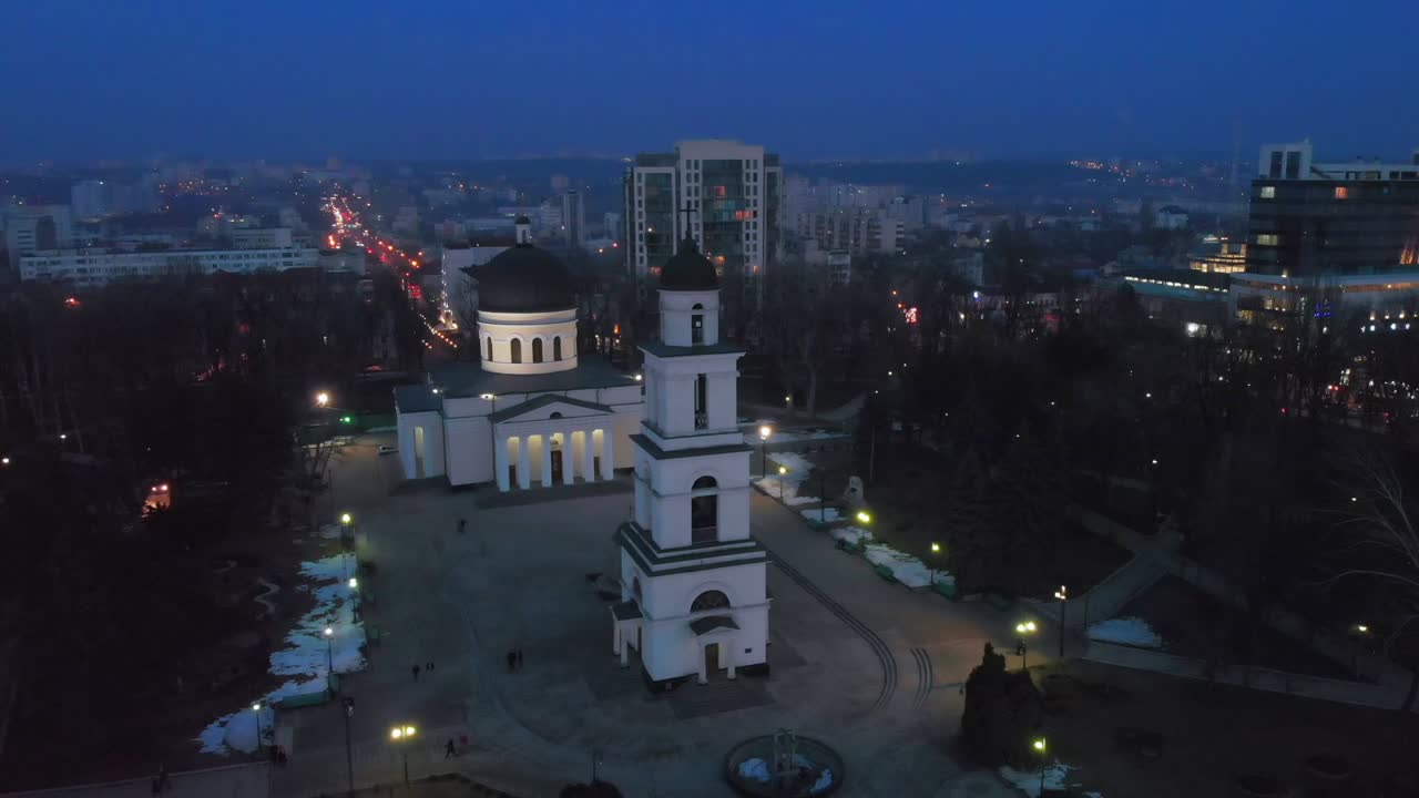 Cityscape at Night with Cathedral