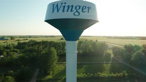 aerial ascend to the top of winger, minnesota's water tower