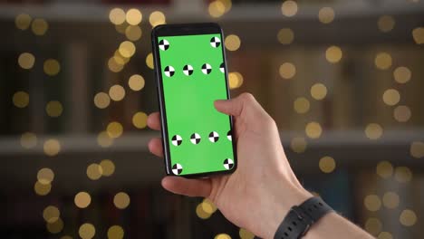 man is swiping left the content on mobile with tracking points and making double tap to choose