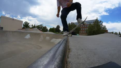 skateboarding a halfpipe at the skatepark