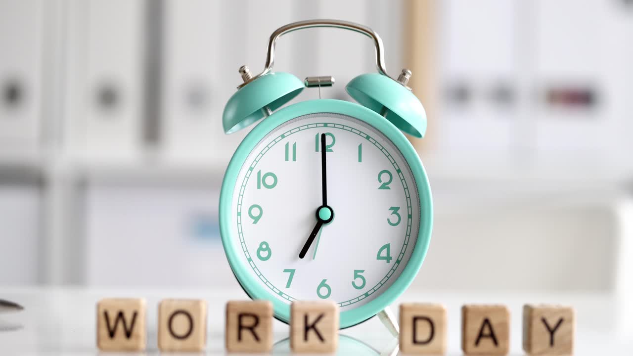 Alarm clock showing 7 o'clock on a workday
