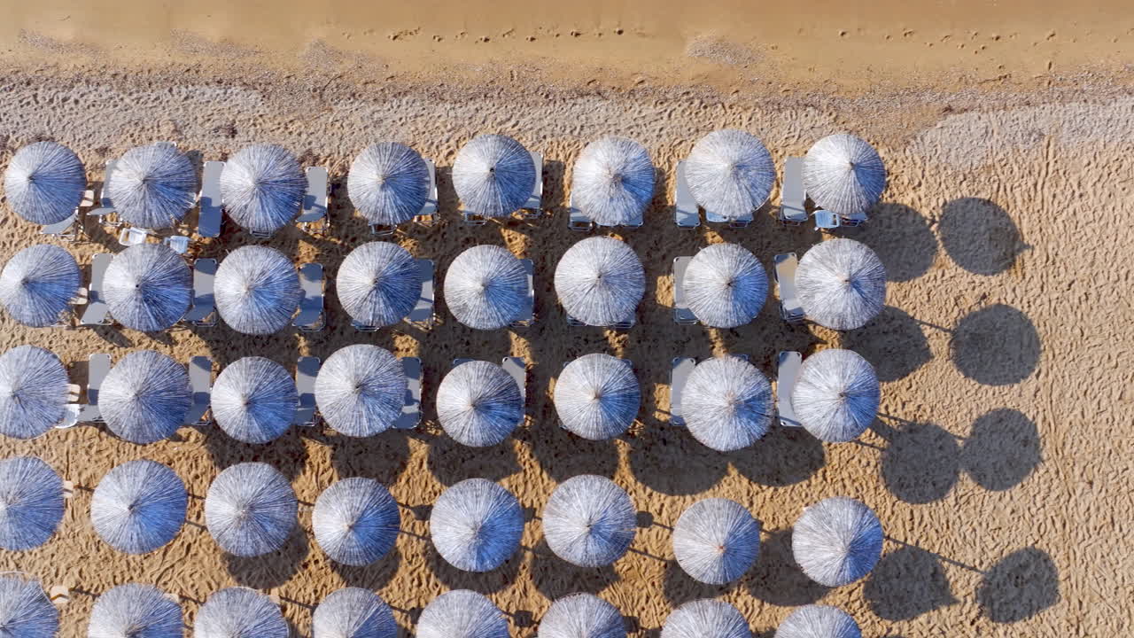 Aerial view of beach with umbrellas