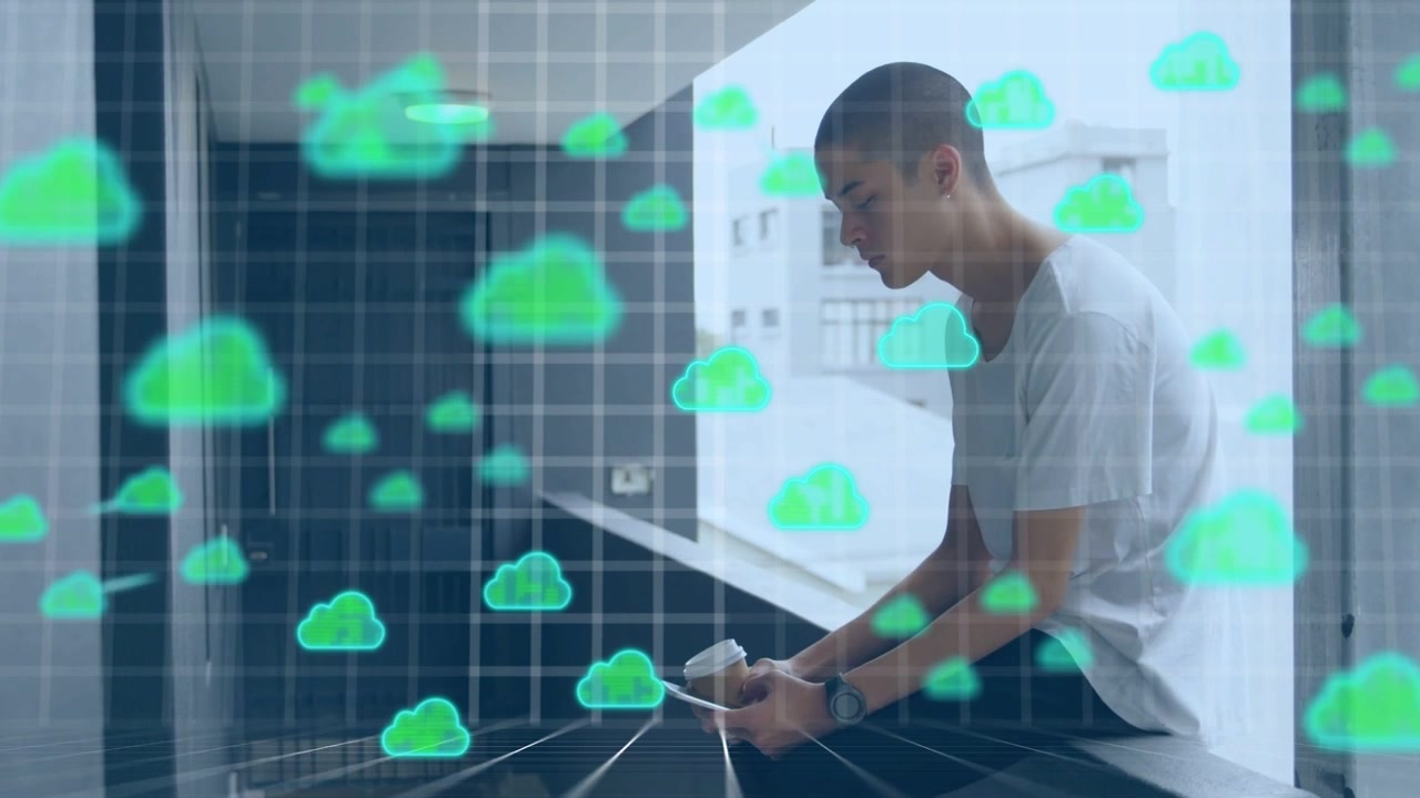 Man sitting on window ledge, tapping phone and checking sync as cloud icons multiplying over scene