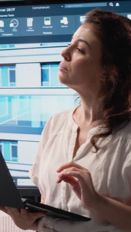 vertical video professional property developer analyzes zoning regulations and project plans