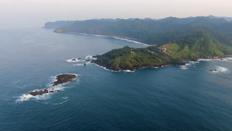 Aerial-panoramic-view-of-Menganti-beach,-Kebumen-in-Indonesia