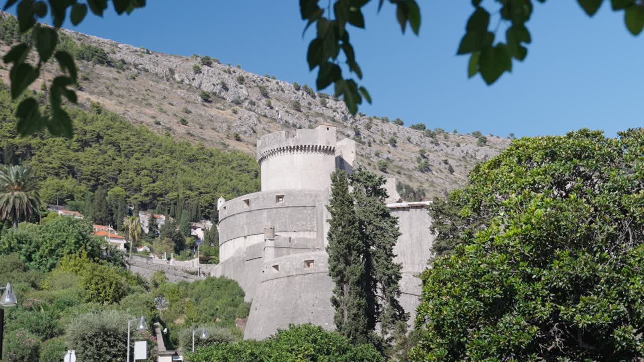 Revealing view on the Minceta Stronghold and its fortified walls as part of the big Fortress of Dubrovnik Croatia protecting the Old Town on a bright summer day