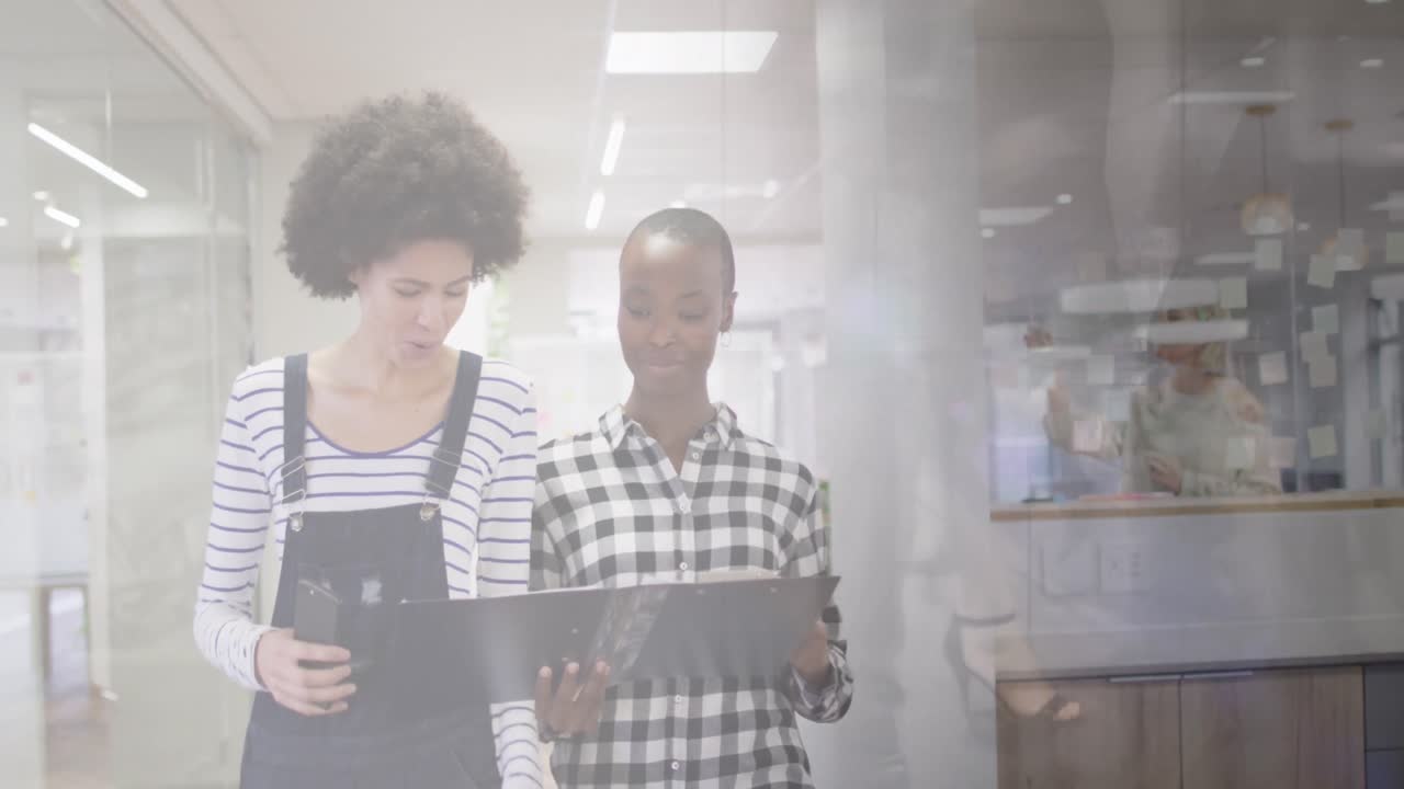 Animation of diverse business people in office over cityscape