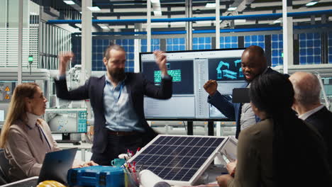 businesspeople dance and celebrate successful investment in solar energy