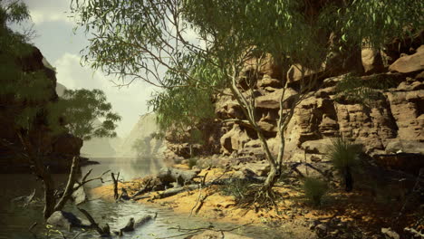 peaceful riverside landscape with lush green trees and rocky cliffs at dusk