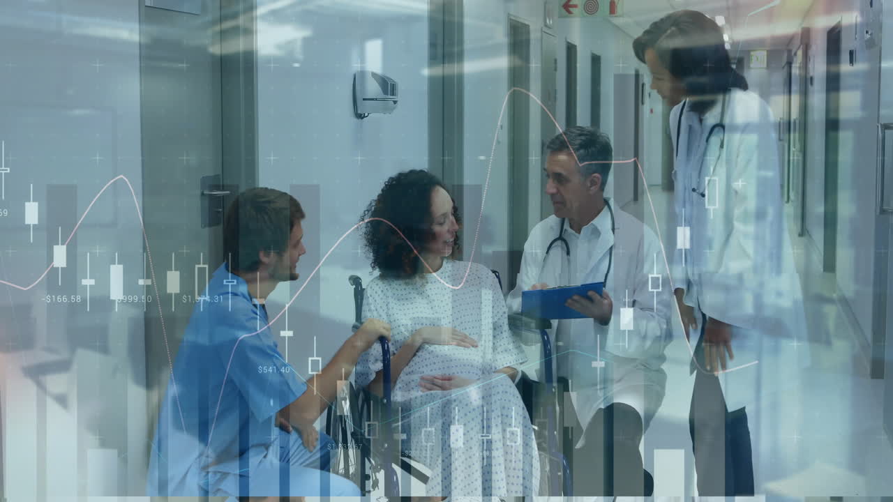 Healthcare team consulting pregnant patient in hospital corridor, showing financial chart overlays