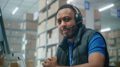 warehouse employee at computer