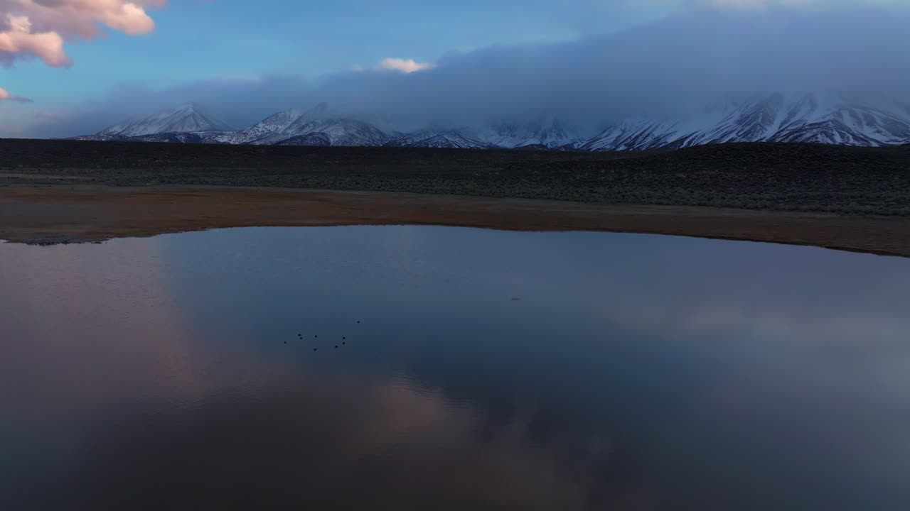 Mammoth Lakes birds Convict Canyon Minarets Sierra Nevada mountains Hilltop Wild Willy's Hot Springs California aerial drone Benton Crossing Long Valley Caldera winter vibrant sunset clouds forwards