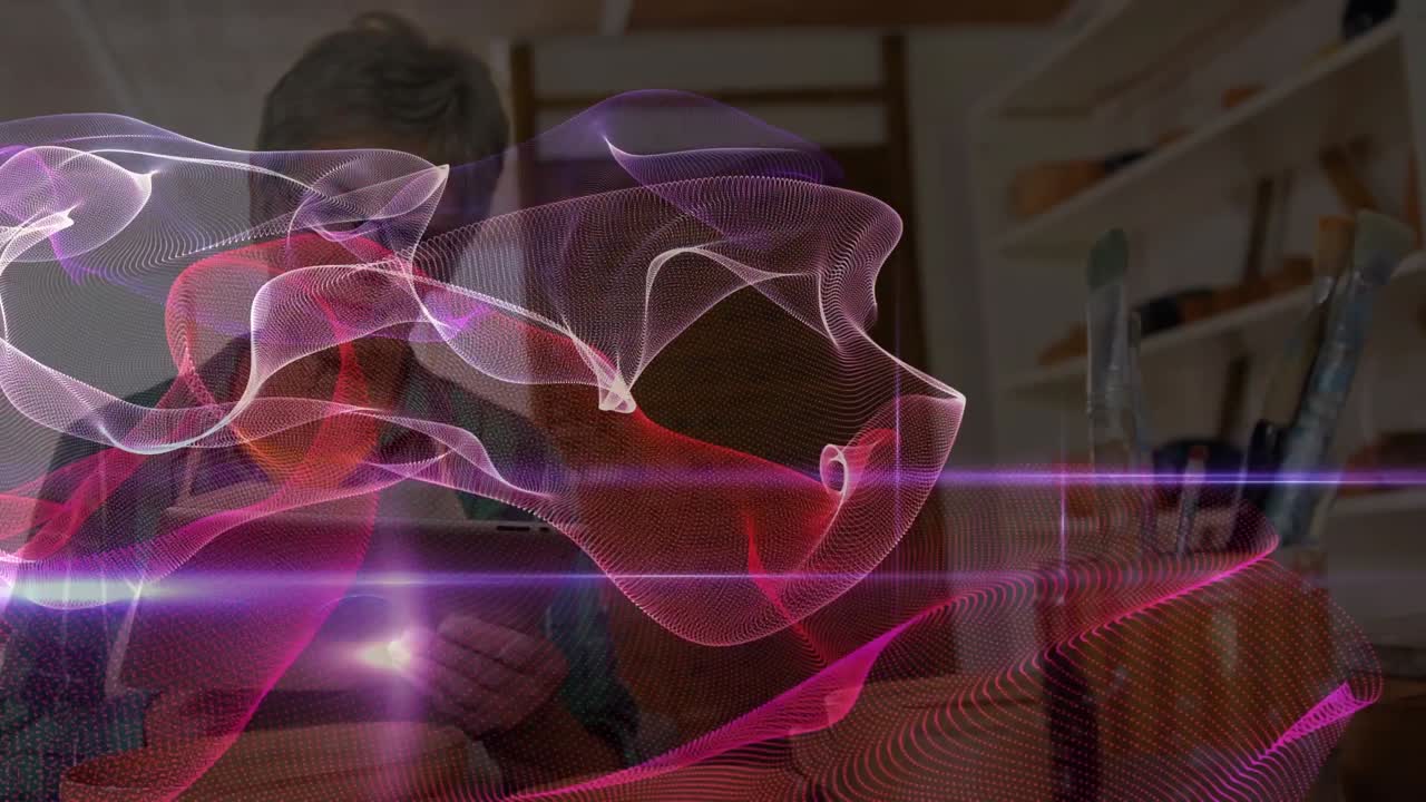 Animation of light trails and shapes over caucasian businesswoman using tablet