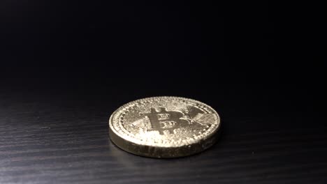 spinning crypto currency gold bitcoin - btc - bit coin. macro shot