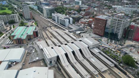 pull back drone aerial reverse reveal reading railway station uk