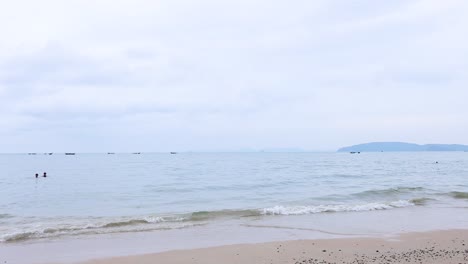 beachgoers enjoy the serene krabi coastline