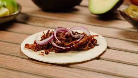preparing a delicious taco