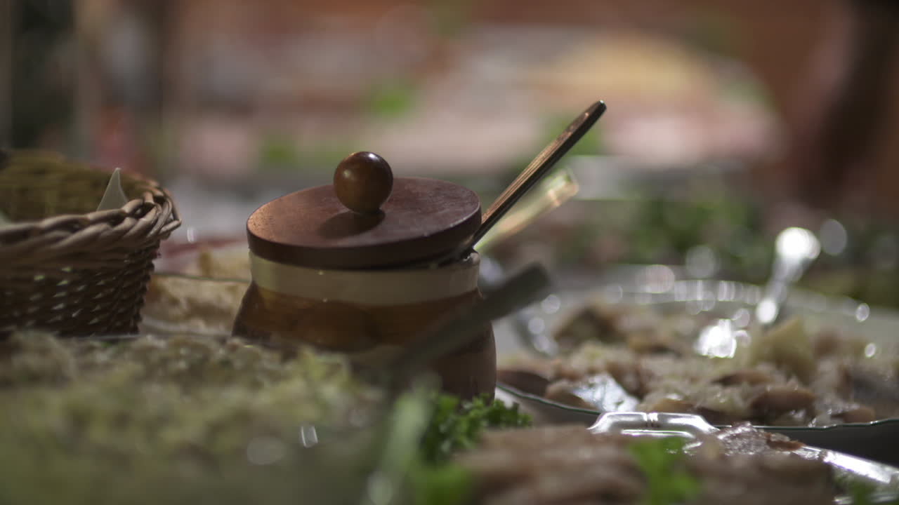 Close Up Of Jar Of Lard And Cold Cuts On Rustic Table