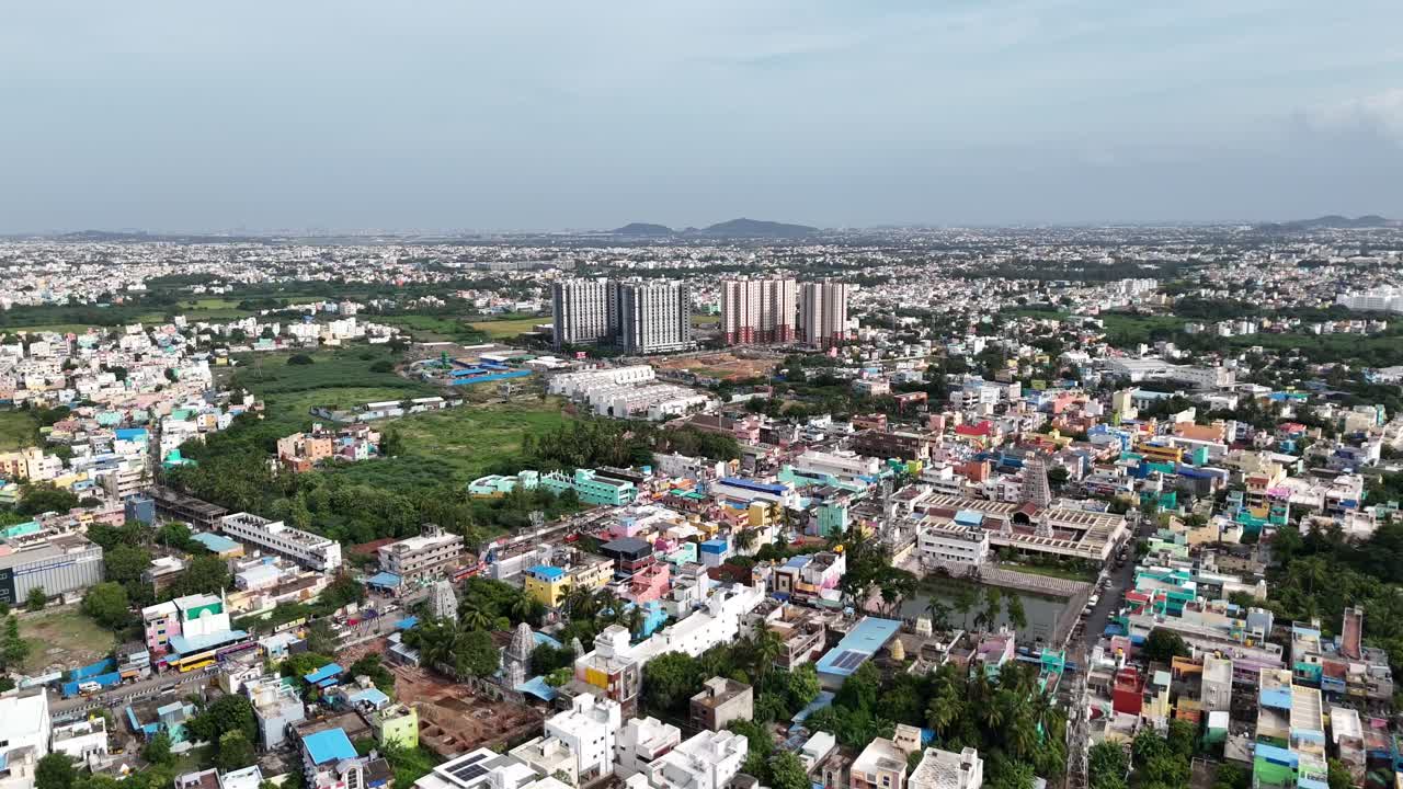Vertical growth in Chennai, Tamil Nadu. An aerial view of a massive complex of modern apartment towers symbolizing rapid metropolitan expansion in India. Area Mangadu outskrits of Chennai city