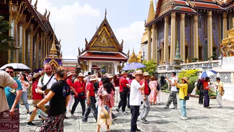 tourists explore the temple grounds in bangkok