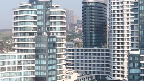 Modern-high-rise-buildings-in-uMhlanga,-Durban-with-clear-skies