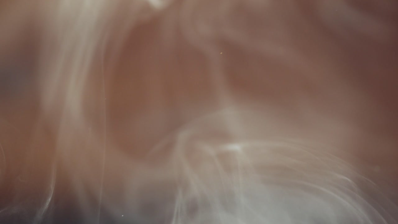 remolinos de humo y bucles sobre fondo marrón