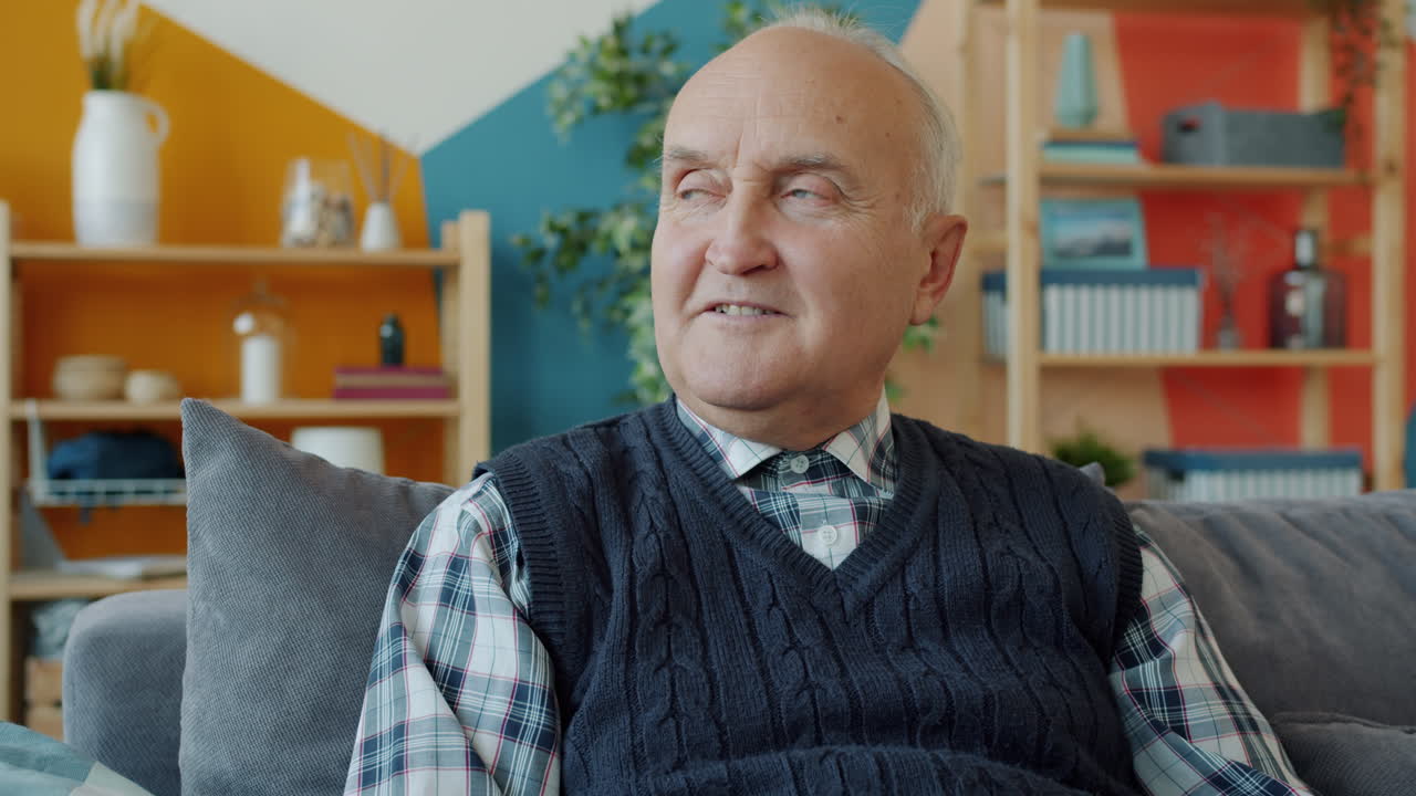 Older Man Sitting on a Sofa