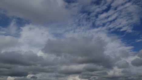 dynamic cloud formations in a blue sky