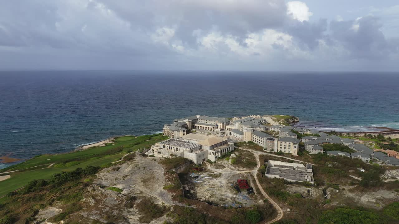 fly over ruins of abandoned resort off coast of Playa de Macao