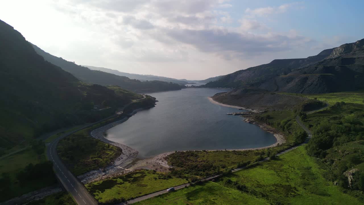 Stunning Llanberis Valley - aerial drone Llyn Peris approach on a sunny late summer afternoon - North Wales, UK