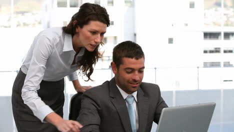 businesspeople working on a computer