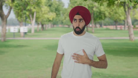 Sick-Sikh-Indian-man-having-an-Asthma-attack-in-park