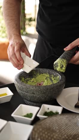 preparing guacamole