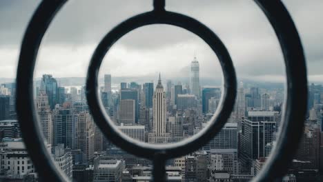 new york city skyline through a circular frame