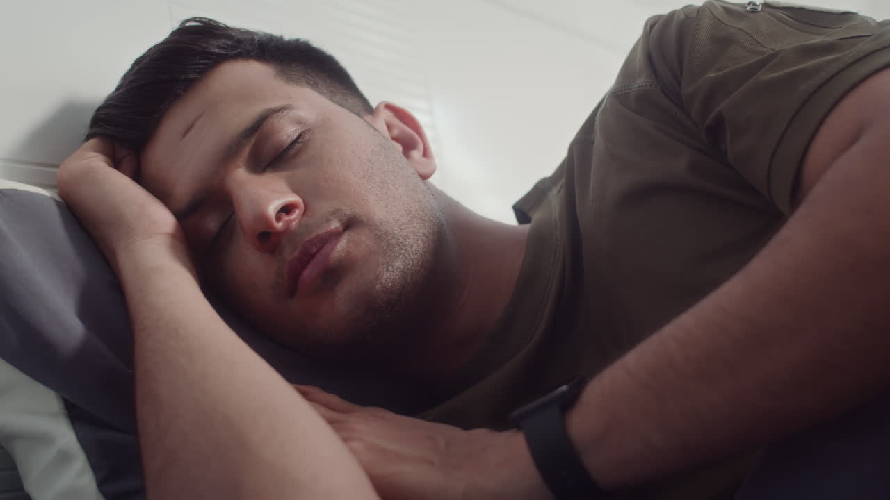 Indian Man Sleeping on Pillow in Comfy Bed
