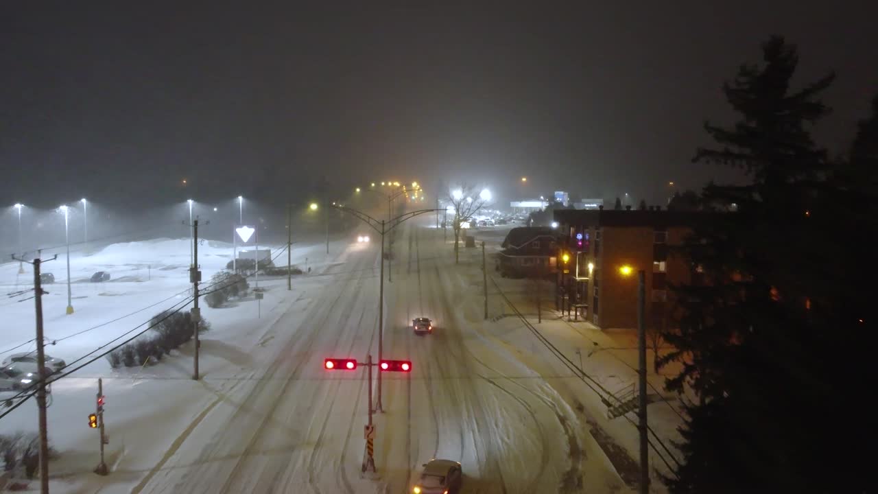 Snow covered road infrastructure at night Canada North America snowfall