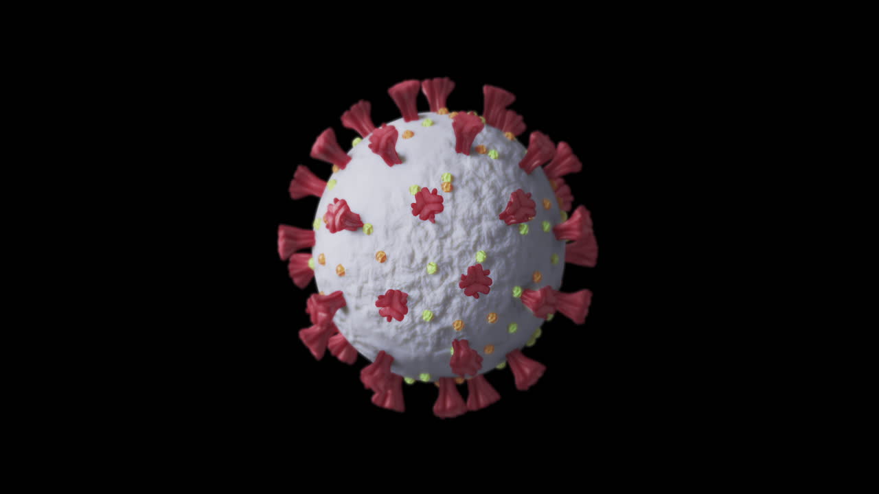 células de covid-19 girando contra un fondo negro