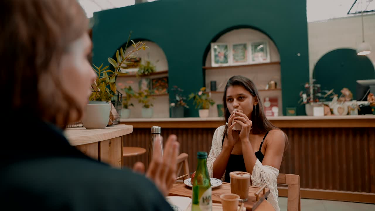 Two women having coffee at a cafe