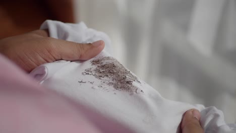 removing a stubborn stain from a white shirt