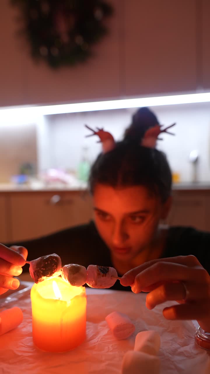 A woman making marshmallow candies