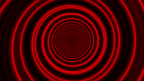 animazione di un tunnel ipnotico rosso luminoso con spirali su sfondo nero