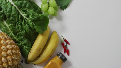 Video-of-fresh-fruit-and-vegetables-on-white-background