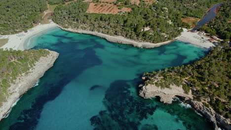 Nature-Haven-At-Balearic-Islands-With-Cala-Mondrago-And-S'Amarador-Turquoise-Beach-Water-In-Mallorca,-Spain