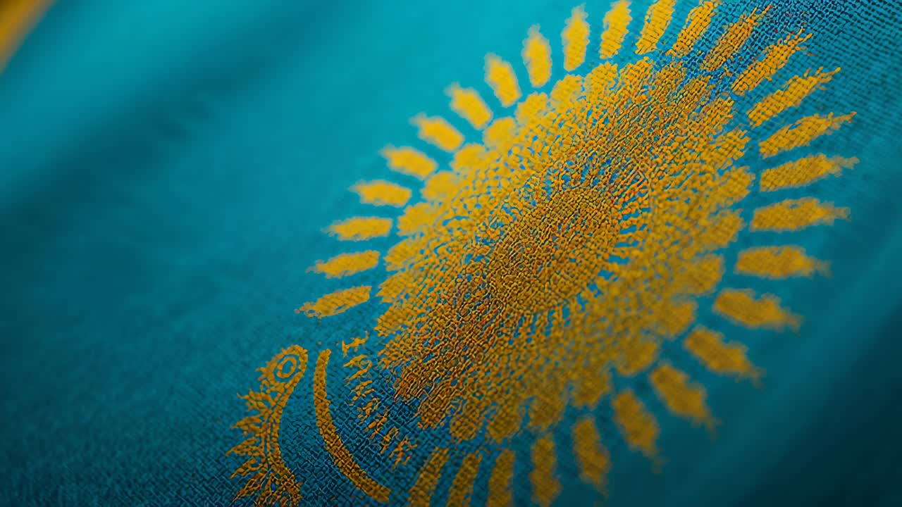 Playback starting camera sliding, focus pulling teal fabric in studio, revealing golden medallion