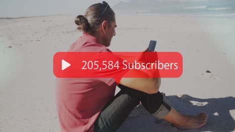 animation of speech bubble with subscribers text and numbers over man using smartphone on beach
