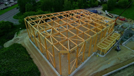 cinematic drone shot of a wood construction work