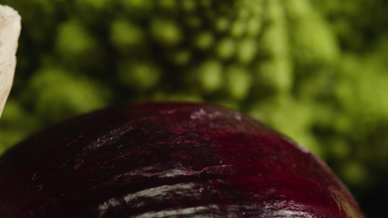 Close-up Rack Focus from Romanesco Broccoli to Red Onion